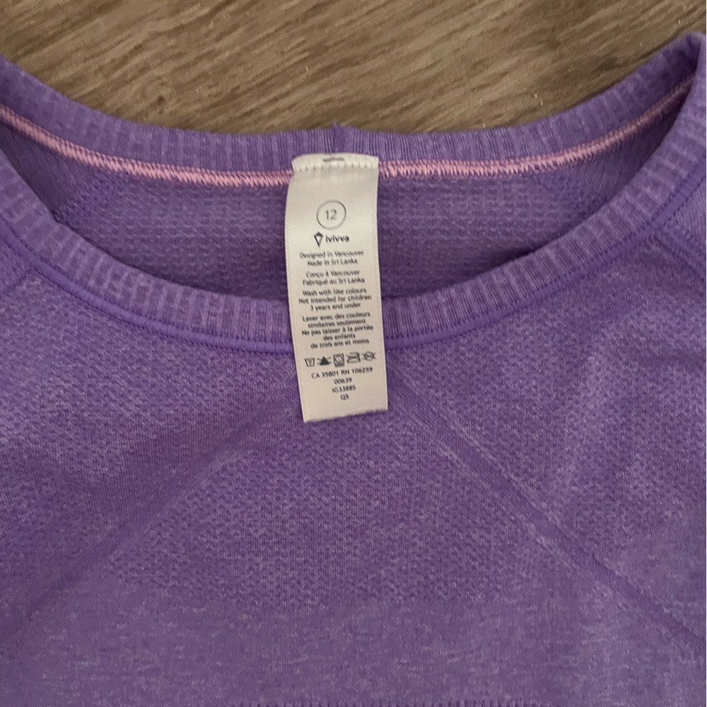 Lululemon kids shirt fits like a woman’s xs